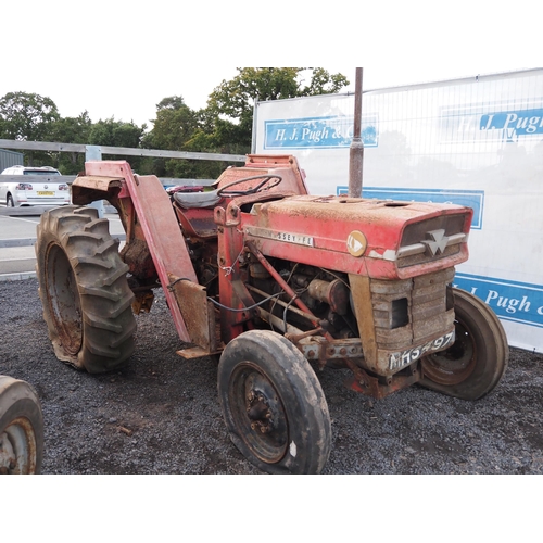 765 - Massey Ferguson 135 tractor. Serial no. 83682. C/w loader brackets. Reg. MHS 497E