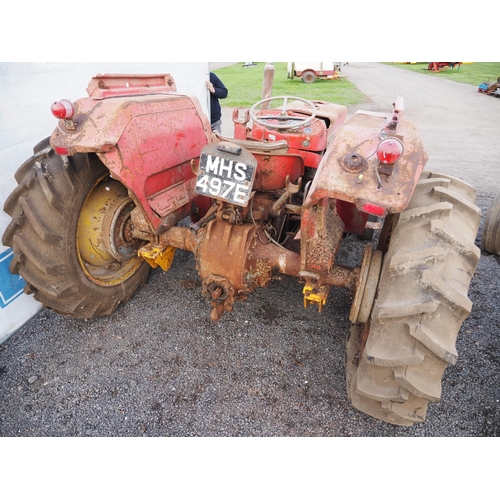 765 - Massey Ferguson 135 tractor. Serial no. 83682. C/w loader brackets. Reg. MHS 497E