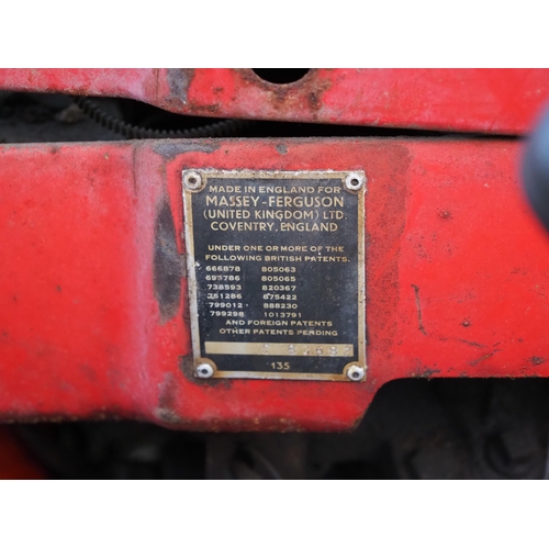 765 - Massey Ferguson 135 tractor. Serial no. 83682. C/w loader brackets. Reg. MHS 497E