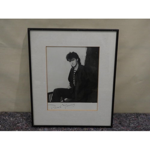 279 - Photo of Paul Young in frame and signed 7