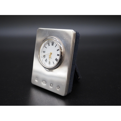 201 - Small silver front clock by Quartz