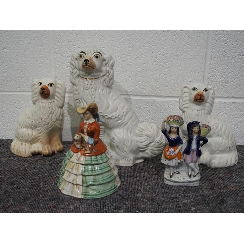 43 - Staffordshire figures to include dogs, figure couple and crinoline lady