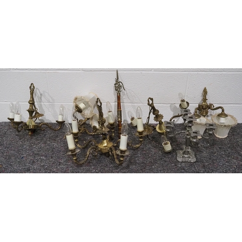 34 - Assorted brass light fittings and candlestick