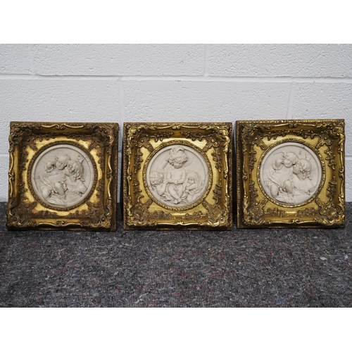 242 - Circular marble plaques carved in relief within ornate gilt frames dated 1878 11