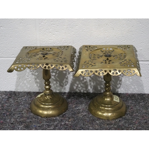 63 - Pair of brass kettle stands
