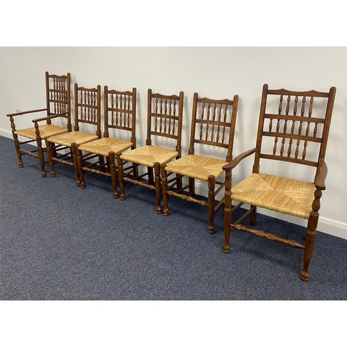 315 - Set of 6 spindle back dining chairs in oak with rush seats