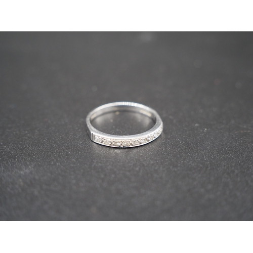 196 - 18ct White gold and diamond half eternity ring