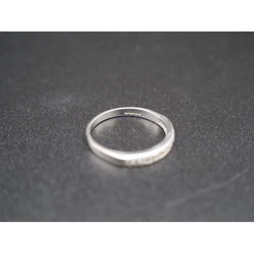 196 - 18ct White gold and diamond half eternity ring