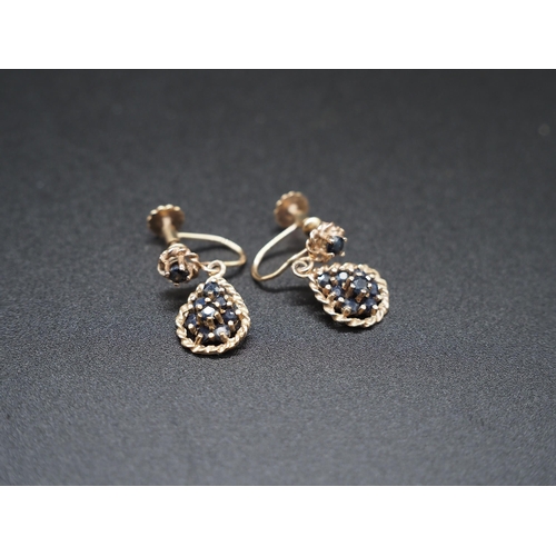 200 - Pair of 9ct gold and black sapphire drop earrings