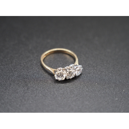 229 - 9ct Gold 3 white stone ring