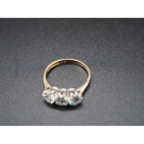 229 - 9ct Gold 3 white stone ring