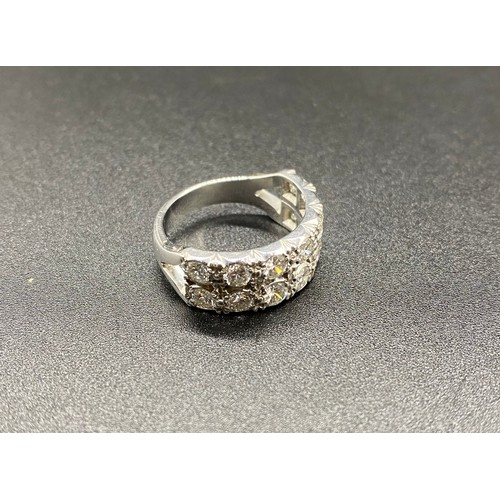 232 - White metal double half eternity ring, set with 14, 15-20 point diamonds. Approx. 8.1g