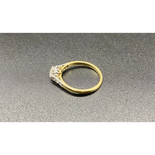 233 - 18ct Yellow gold and platinum solitaire diamond ring, ½