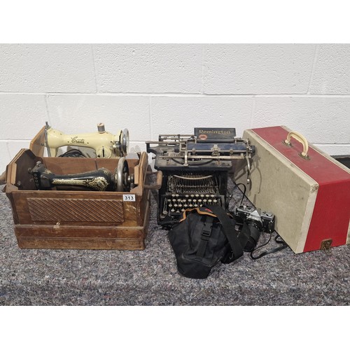 313 - Olympus OM-1 camera, Rimington typewriter, Singer sewing machine and Cresta sewing machine