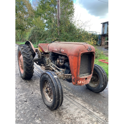 146 - Massey Ferguson 35 4 cylinder tractor. Runs and drives. Good restoration project. No docs