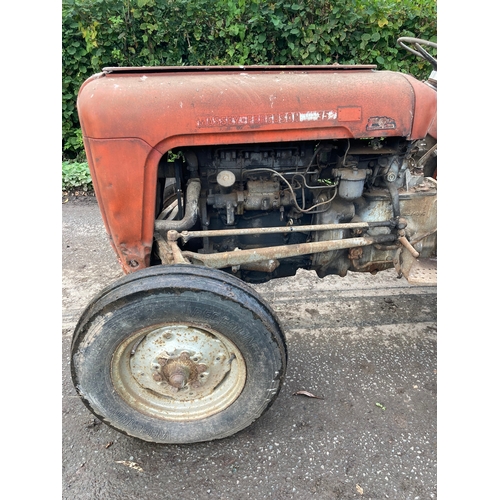 146 - Massey Ferguson 35 4 cylinder tractor. Runs and drives. Good restoration project. No docs