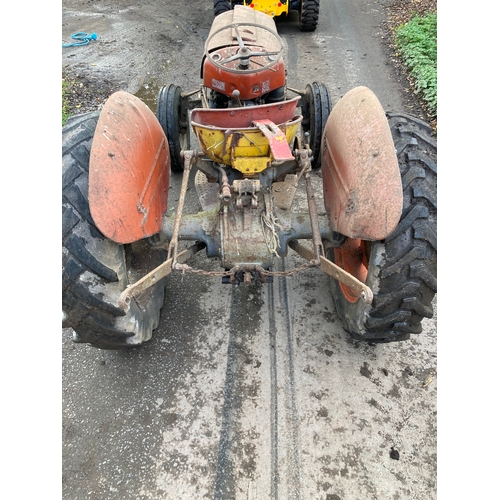 146 - Massey Ferguson 35 4 cylinder tractor. Runs and drives. Good restoration project. No docs