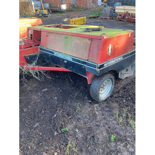 205 - International 554 conventional baler