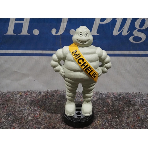 585 - Cast iron Michelin man 14