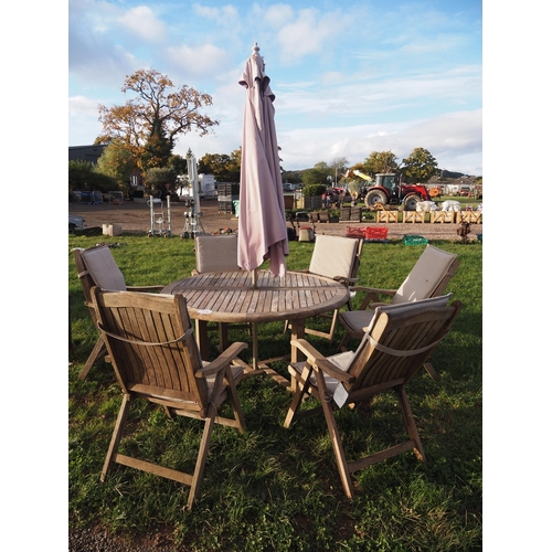 225 - Garden table and 6 chairs with cushions and parasol