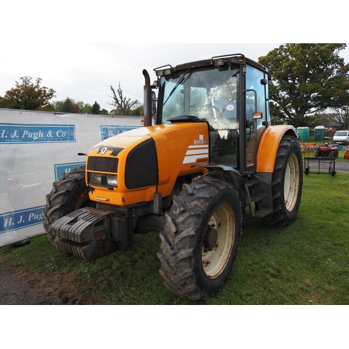 1456 - Renault 610 RX tractor. Runs and drives. C/w front weights. 8250 hours showing. Reg. T162 BSH