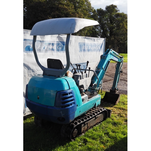 1523 - Kubota K-015 1.5 ton mini digger. Runs and drives, showing 3500 hours