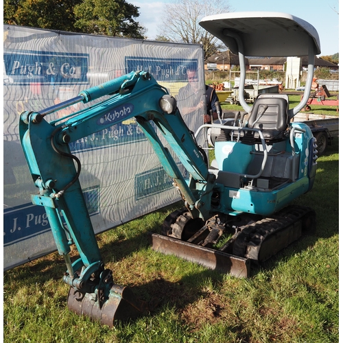 1523 - Kubota K-015 1.5 ton mini digger. Runs and drives, showing 3500 hours