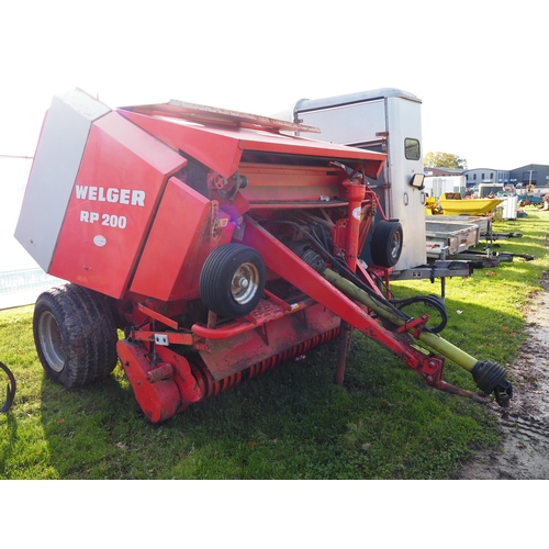 1604 - Welger RP 200 baler, off farm