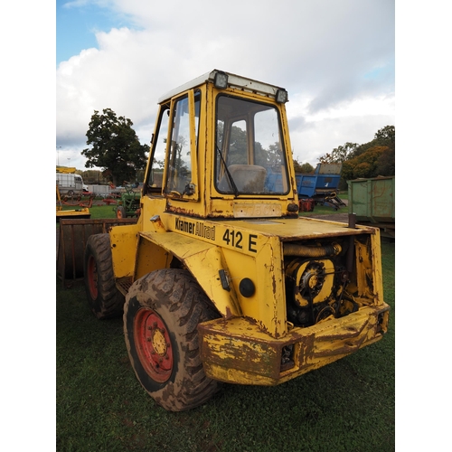 1442 - Kramer Allrad 412E loader. Runs and drives, 14480 hours showing. C/w muck fork and bucket. SN 116576