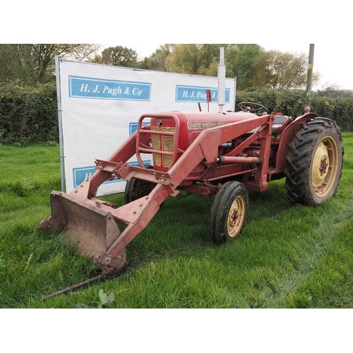 80 - David Brown 990 Implematic tractor. Fitted with front end loader, forks and bucket. Runs and drives.... 