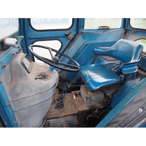 82 - Ford 4100 tractor. Fitted with Quicke 2560 front end loader and bucket. Lambourne cab. Runs and driv... 