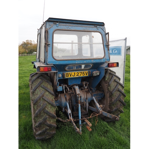 82 - Ford 4100 tractor. Fitted with Quicke 2560 front end loader and bucket. Lambourne cab. Runs and driv... 
