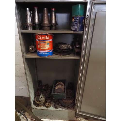 142 - Metal cabinet and contents to include cutters