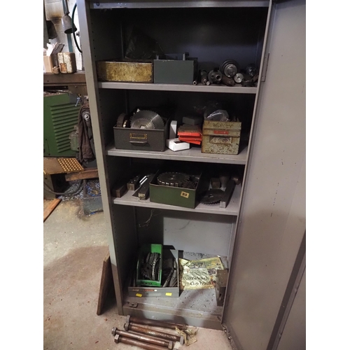 145 - Metal cabinet and contents to include cutters and collets