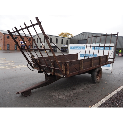 570 - Ferguson 3 ton tipping trailer with hayracks and extension