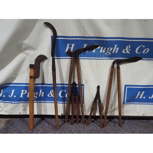 427 - Vintage garden tools to include loppers, shears, brush axe, etc.