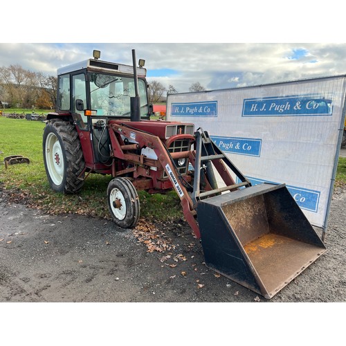 549 - International 684 tractor, 1978. C/w front end Quicke 2030 loader and bucket. Runs and drives. Showi... 
