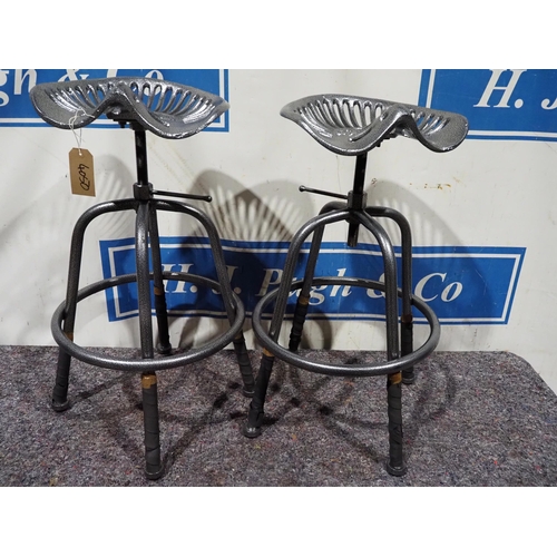 584 - Pair of heavy duty tractor seat stools