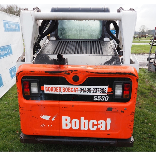 1216 - Bobcat 5530 compact skid steer. 2014. Very tidy, showing 1461 hours, c/w muck grab, bucket and palle... 