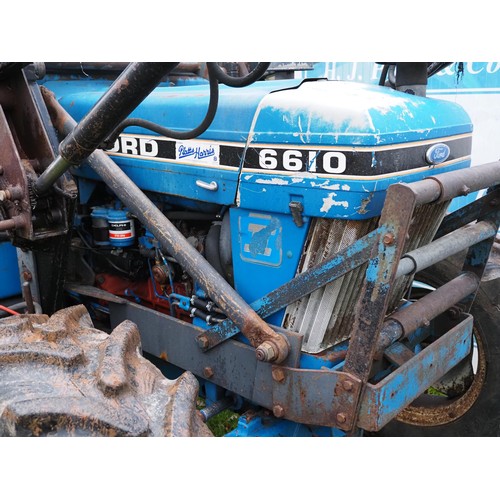 1211 - Ford 6610 4wd tractor. Runs and drives. C/w Farmhand loader, Pick up hitch and good front tyres. Sho... 