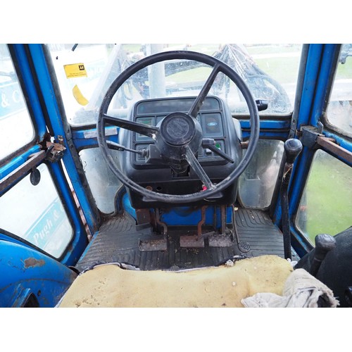 1211 - Ford 6610 4wd tractor. Runs and drives. C/w Farmhand loader, Pick up hitch and good front tyres. Sho... 