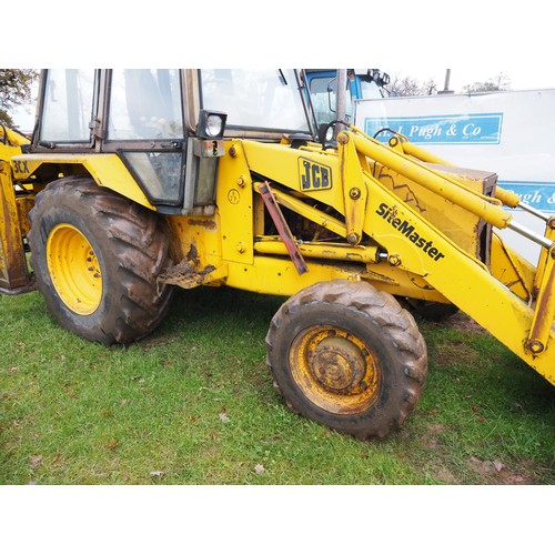 1212 - JCB 3CX Sitemaster. Runs and drives. C/w extra dig 4 in 1 bucket. 4999 Hours. Reg. F238 BFK