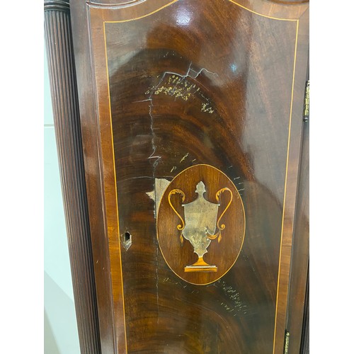 567 - Antique eight day long cased clock in mahogany with brass face and inlaid detailing H89