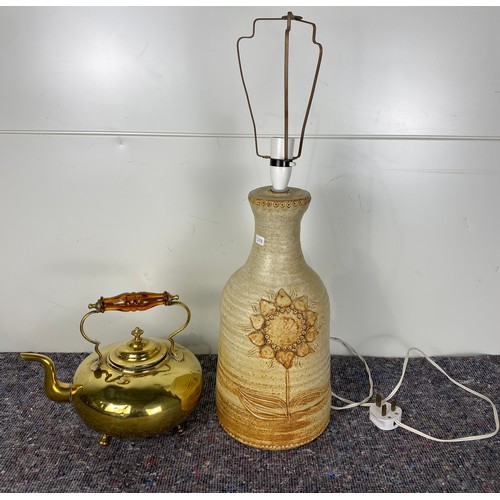 451 - Brass teapot and pottery lamp with sunflower pattern