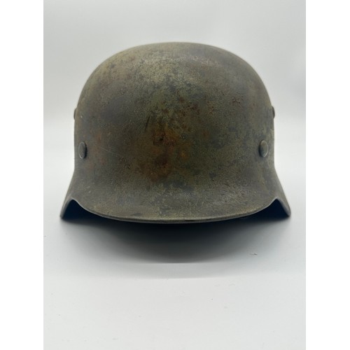 196 - WWII Luftwaffe steel helmet in Normandy camo