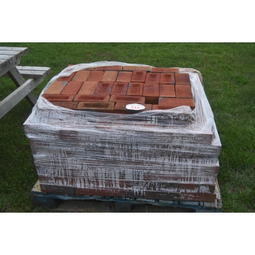 312 - Pallet of red bricks