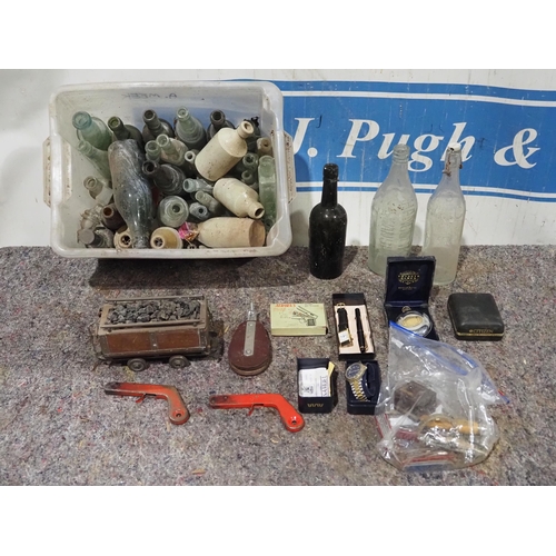 417 - Assorted vintage glass bottles, watches, Swiss army knives etc