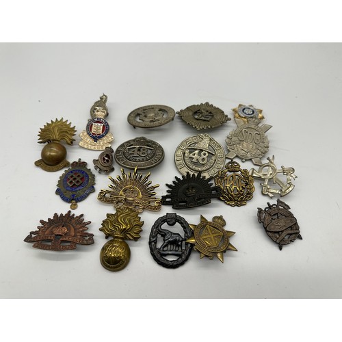 257 - Grouping of overseas and Commonwealth cap badges - 20