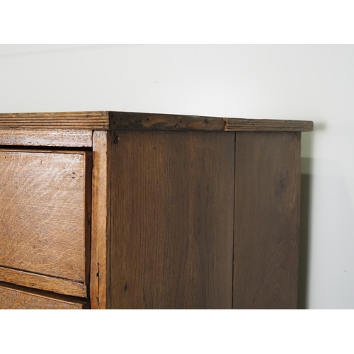 587 - Georgian chest of 2 short and 3 long graduated drawers in oak with brass handles H40½