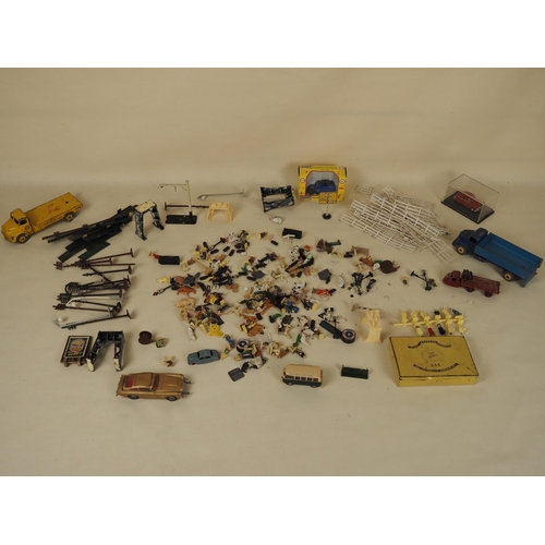 59 - Quantity of miniature train station accessories to include figures, signal points, fences, signs, et... 